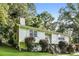 Charming two-story home with manicured shrubs, stairway and front porch at 2636 Suzanne Ln, Acworth, GA 30102