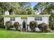 Charming home featuring lush landscaping, a cozy entrance, and a well-maintained front yard at 2636 Suzanne Ln, Acworth, GA 30102
