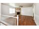 Bright living room featuring a stone fireplace and hardwood floors at 2636 Suzanne Ln, Acworth, GA 30102
