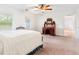 Bedroom with bed, bureau, and windows at 3109 Country Lake Dr, Powder Springs, GA 30127