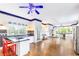 Huge eat-in kitchen featuring custom cabinetry, large center island, and stainless steel appliances at 3109 Country Lake Dr, Powder Springs, GA 30127