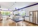 Expansive kitchen with granite countertops, custom cabinetry, and stainless steel appliances at 3109 Country Lake Dr, Powder Springs, GA 30127