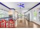 Spacious eat-in kitchen featuring custom cabinetry, large center island, and stainless steel appliances at 3109 Country Lake Dr, Powder Springs, GA 30127