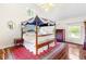 Spacious main bedroom with a four-poster bed, hardwood floors, and a water view at 3109 Country Lake Dr, Powder Springs, GA 30127