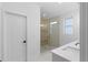 Bright bathroom featuring a glass shower and vanity sink at 90 Cleveland Unit B Se St, Atlanta, GA 30316