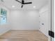 Modern bedroom with hardwood floors, ceiling fan, and ample closet space at 90 Cleveland Unit B Se St, Atlanta, GA 30316
