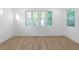 Bright bedroom featuring wood floors and windows at 90 Cleveland Unit B Se St, Atlanta, GA 30316