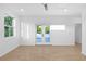 Bright bedroom features large windows, ceiling fan, and access to balcony at 90 Cleveland Unit B Se St, Atlanta, GA 30316