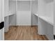 Walk-in closet with hardwood floors and shelving for optimal storage at 90 Cleveland Unit B Se St, Atlanta, GA 30316