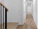 Light-filled hallway with hardwood floors and crisp white walls, creating a seamless flow at 90 Cleveland Unit B Se St, Atlanta, GA 30316