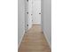 Bright hallway features light hardwood floors and white trim at 90 Cleveland Unit B Se St, Atlanta, GA 30316
