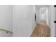 Hallway with wood floors, recessed lighting, and stairway access at 90 Cleveland Unit B Se St, Atlanta, GA 30316