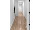 Hallway with wood floors, recessed lighting, and stairway access at 90 Cleveland Unit B Se St, Atlanta, GA 30316