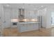 Stylish kitchen with an island, stainless steel appliances, and modern pendant lighting at 90 Cleveland Unit B Se St, Atlanta, GA 30316