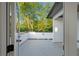 Outdoor patio features white railing and views of lush trees at 90 Cleveland Unit B Se St, Atlanta, GA 30316