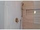Shower area with bronze fixtures and beige accent tiles at 90 Cleveland Unit B Se St, Atlanta, GA 30316