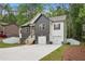 Charming modern two-story home with a manicured lawn and a two-car garage at 2279 Lakeview Pkwy, Villa Rica, GA 30180