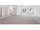A spacious living room offers natural light and a view of the front yard at 2279 Lakeview Pkwy, Villa Rica, GA 30180