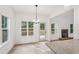 Bright living room featuring wood floors, fireplace, and lots of natural light at 2279 Lakeview Pkwy, Villa Rica, GA 30180