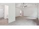 Main bedroom with adjoining bathroom and ceiling fan at 2279 Lakeview Pkwy, Villa Rica, GA 30180