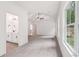 Large main bedroom with adjoining bathroom and large window at 2279 Lakeview Pkwy, Villa Rica, GA 30180