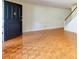 A bright room with wooden flooring next to the staircase at 301 Lakemoore Ne Dr # B, Atlanta, GA 30342
