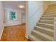An airy room featuring wooden flooring, a staircase and plenty of light at 301 Lakemoore Ne Dr # B, Atlanta, GA 30342