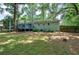 Spacious backyard with lush lawn and deck at 3710 Lavilla Dr, Powder Springs, GA 30127