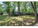Exterior view of backyard with patio at 3710 Lavilla Dr, Powder Springs, GA 30127