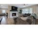 Living room with fireplace and view to dining area at 3710 Lavilla Dr, Powder Springs, GA 30127