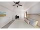 Bright main bedroom featuring neutral tones, plush carpet, and a vaulted ceiling at 4739 Bradford Ln, Powder Springs, GA 30127