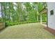 Large backyard features mature trees at 242 Fieldbrook Xing, Canton, GA 30115