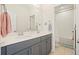 Modern bathroom with double sinks and walk-in shower at 242 Fieldbrook Xing, Canton, GA 30115