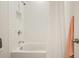 Bathroom features a shower over tub with white subway tile and white shower curtain at 242 Fieldbrook Xing, Canton, GA 30115