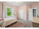 Cozy bedroom with a single bed and large window at 242 Fieldbrook Xing, Canton, GA 30115