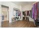 Walk-in closet featuring storage and open doorway, providing optimal organization at 242 Fieldbrook Xing, Canton, GA 30115