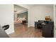 Office space with dark desk and view into the main bedroom at 242 Fieldbrook Xing, Canton, GA 30115