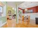 Open concept dining area featuring wood floors and a decorative chandelier at 2853 N Thompson Ne Rd, Brookhaven, GA 30319