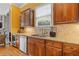 Gourmet kitchen with custom cabinets, granite countertops, and stainless steel appliances at 2853 N Thompson Ne Rd, Brookhaven, GA 30319