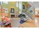 Bright and airy living room with high ceilings, fireplace, and staircase at 2853 N Thompson Ne Rd, Brookhaven, GA 30319