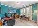 Bright home office with two desks, modern computer equipment, large windows, and comfortable seating at 2853 N Thompson Ne Rd, Brookhaven, GA 30319