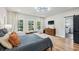 Serene bedroom with natural light, comfortable bedding, and a modern ceiling light fixture at 1010 Violet # A, Atlanta, GA 30310
