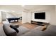 A finished basement with a billiards table, a sectional sofa and a mounted television at 2350 Maxine Se Dr, Marietta, GA 30067