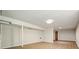 Open basement with wood-look flooring and white walls; potential for customization and flexible use at 2350 Maxine Se Dr, Marietta, GA 30067