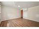 Basement with sleek wood-look floors, neutral walls, and a warm, inviting atmosphere at 2350 Maxine Se Dr, Marietta, GA 30067