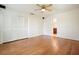 Bedroom with hardwood floors, closet, and a view to the adjacent bathroom at 2350 Maxine Se Dr, Marietta, GA 30067