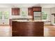 Spacious kitchen featuring a large island with granite countertops and stainless steel appliances at 2350 Maxine Se Dr, Marietta, GA 30067