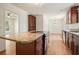 Kitchen island with granite countertops and sleek stainless steel appliances at 2350 Maxine Se Dr, Marietta, GA 30067
