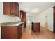 Stylish kitchen with custom cabinets, granite countertops, and stainless steel appliances at 2350 Maxine Se Dr, Marietta, GA 30067
