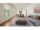 Inviting living room featuring hardwood floors, neutral colors, and ample natural light at 2350 Maxine Se Dr, Marietta, GA 30067